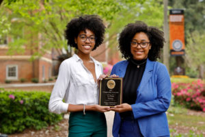 Debate team members and their plaque